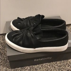 Mia black slip on sneakers